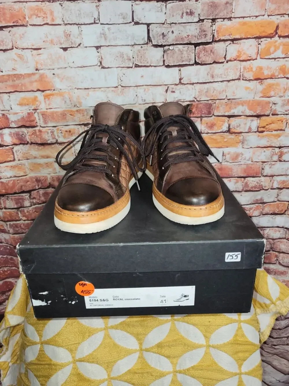 Jose Real high-top Italian sneakers.